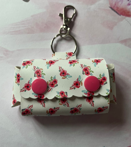 White and pink floral doggy poop bag holder